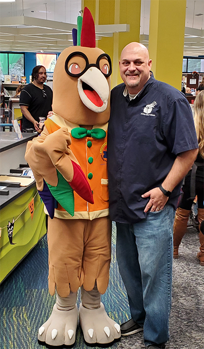 Picture of Pip The Roadrunner and Library Manager Nathaniel Washburn